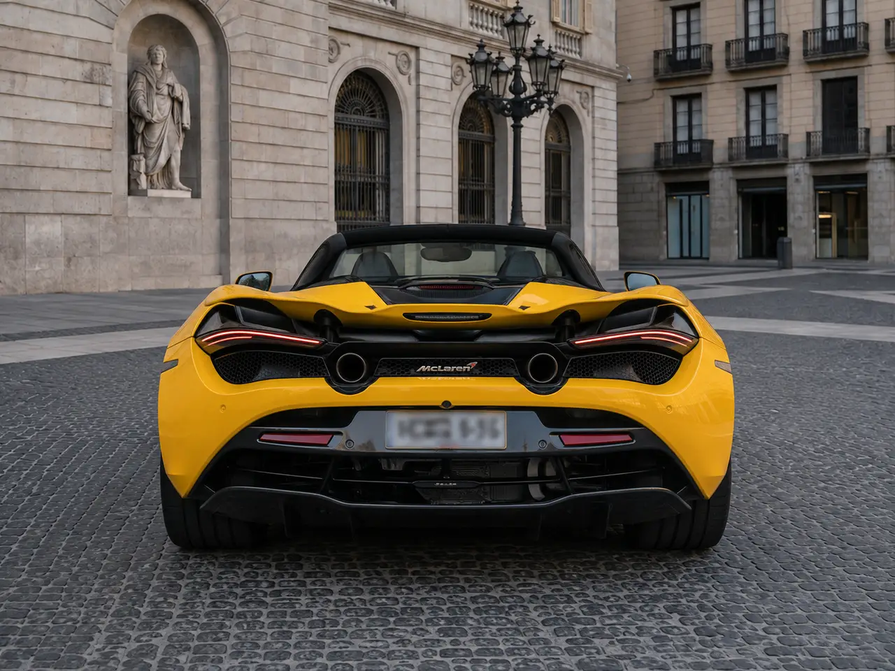 McLaren 720S Spider 2022, rear view — Monaco Luxury Car Rental, Monaco. McLaren 720S Spider in Monaco A McLaren 720S Spider rental in Monaco introduces a…